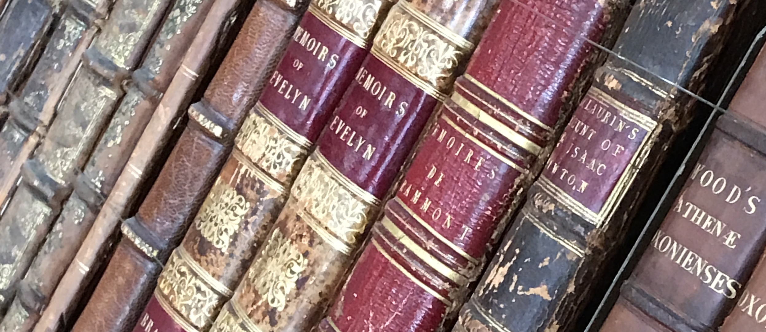 Close up image of antique book spines