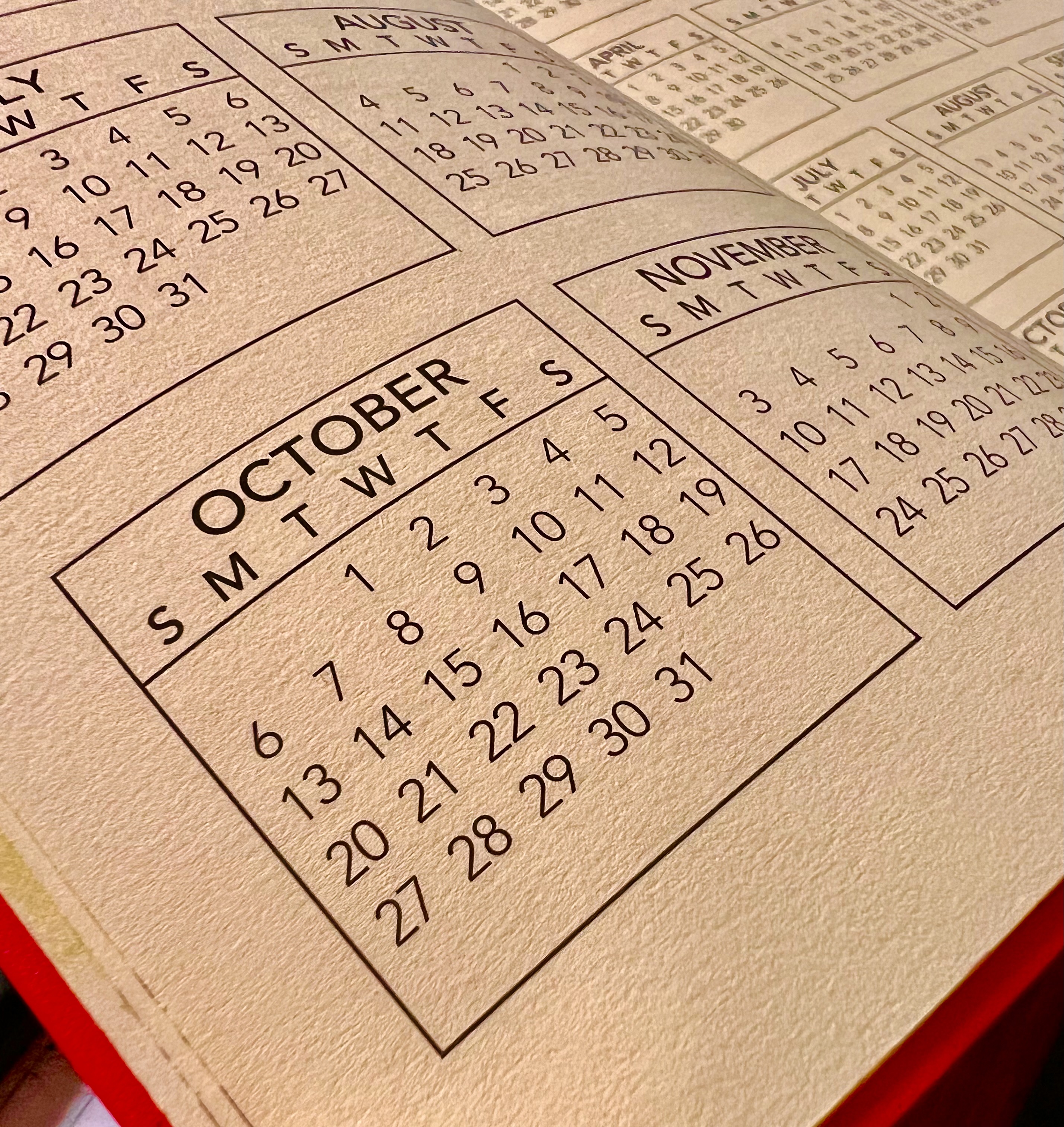 Close up photo of calendar showing the month of October